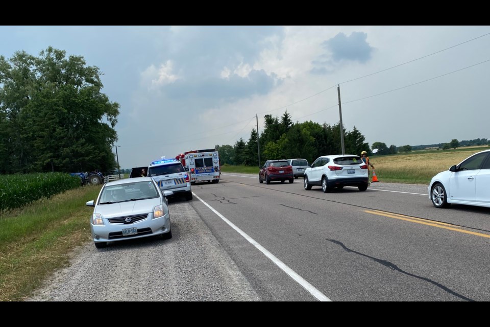 Cars line Highway 26 after a serious collision prompted police to close the road between Horseshoe Valley and Fralick Road in Springwater. Sam Hossack Media 