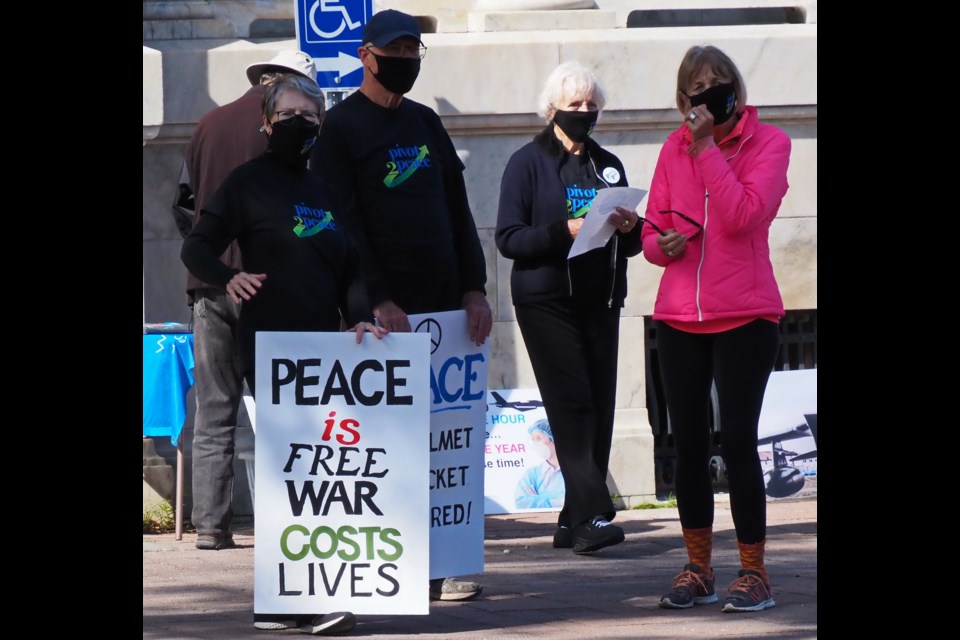 Pivot2Peace members were outside the Collingwood federal building on Hurontario Street yesterday to mark World Peace Day. Contributed photo