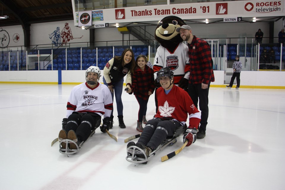 Tara Slone, host of Hometown Hockey, dropped the first puck for the celebrity sledge hockey game on Friday night. Erika Engel/CollingwoodToday