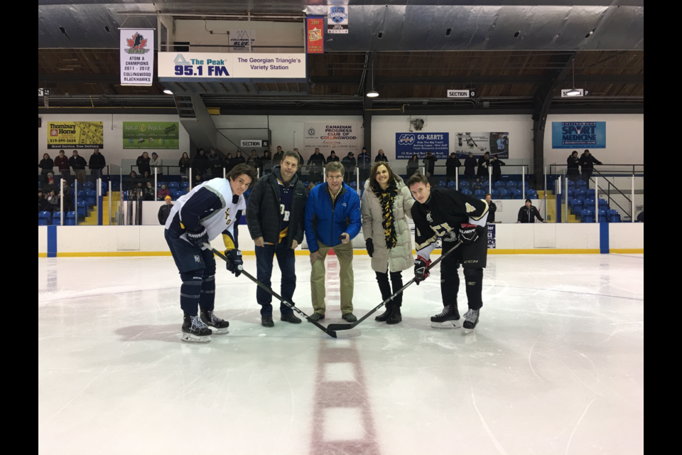 Mayor Brian Saunderson drops the puck on the final game of the day featuring the CCI and Jean Vanier boys teams. Vanier took the win. Contributed photo