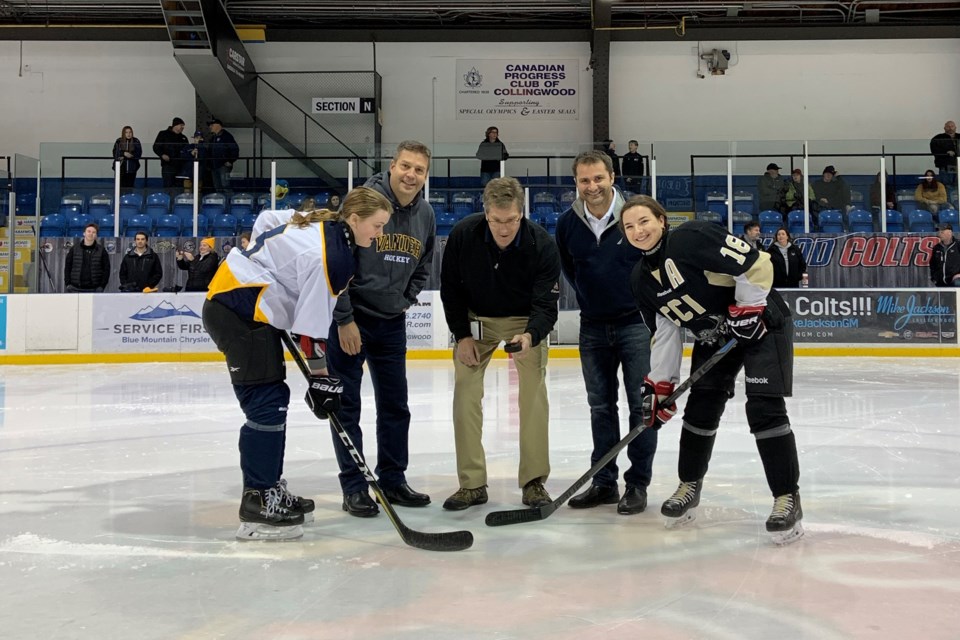 Mayor Brian Saunderson drops the puck for the girls' hockey game featuring CCI vs Vanier at the Eddie Bush Memorial Arena on Jan. 15. Contributed photo