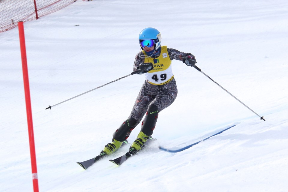 Sarah Tyler of the Elliott Lake Ski Club carves around the slalom gates.
 Gisele Winton Sarvis/Collingwood Today