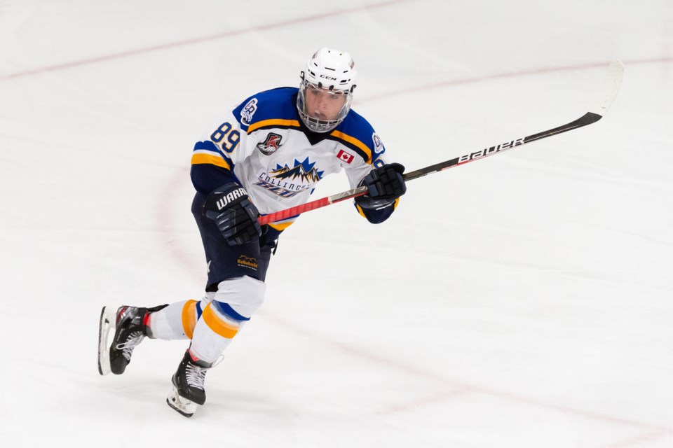 Will Redick #89 of the Collingwood Blues skates up ice during the second period at the Gordon Alcott Memorial Arena on October 30, 2021 in Ontario, Canada.
     