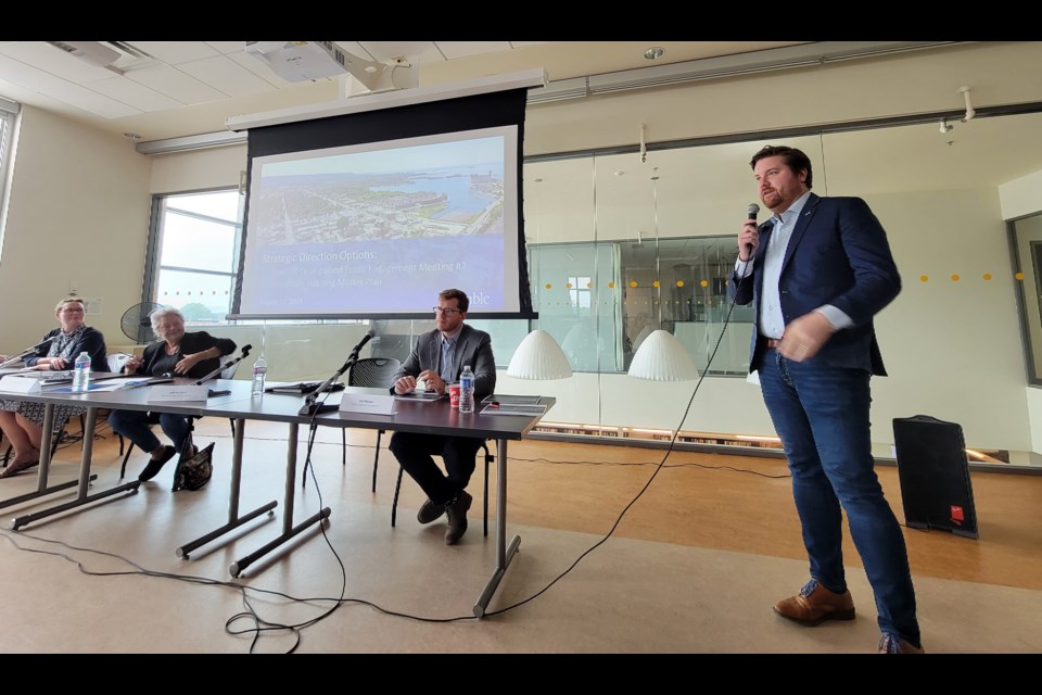 From left to right, the town's director of planning, building and economic development Summer Valentine, affordable housing task force member Marg Scheben-Edey, partner at N. Barry Lyon Consulting Nick Michael and associate Josh MacLeod. The panel spoke as part of an affordable housing open house at the Collingwood Public Library on Aug. 15, 2023.