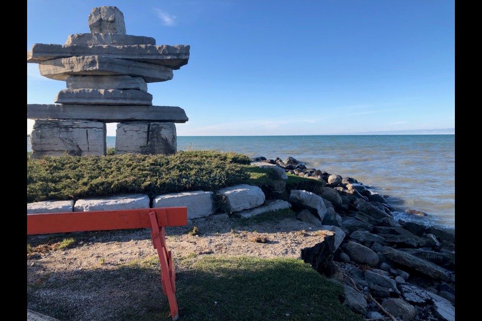 The landscaped base constructed for the Inukshuk has been partly washed away. Before yesterday, there was enough grassland to walk around the Inukshuk on this side. Erika Engel/CollingwoodToday