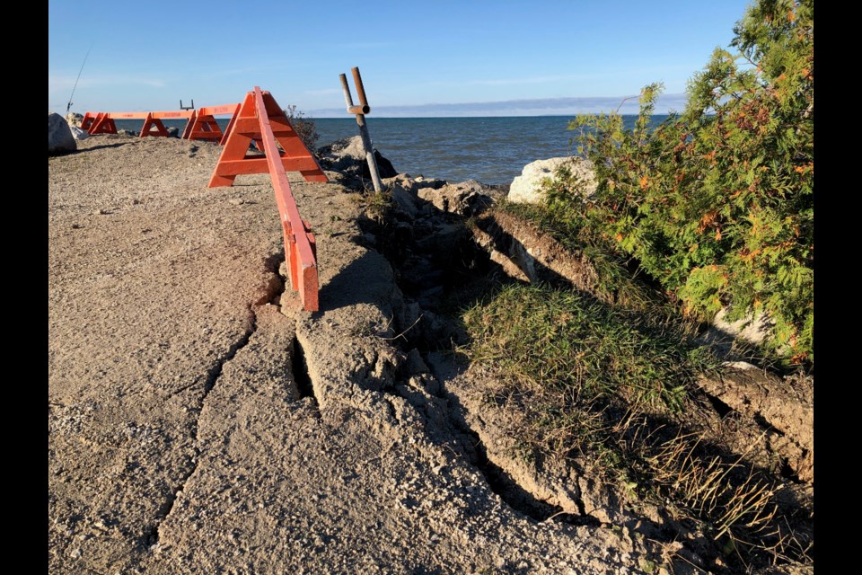 The ground is cracked and sliding into the water along the eastern shore of Sunset Point. Erika Engel/CollingwoodToday