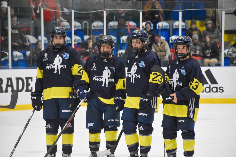 Team Adidas on the ice during the Sunday game at Eddie Bush. 