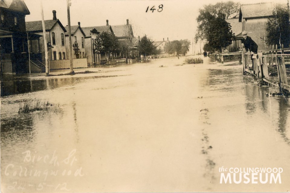 This photo was taken at the intersection of Birch and Second Streets during the flood of 1912. Photo contributed by Collingwood Museum Huron Institute 148, 150, 164, 165; Collingwood Museum Collection X970.794.1, X969.594.1, X970.783.1, X970.789.1