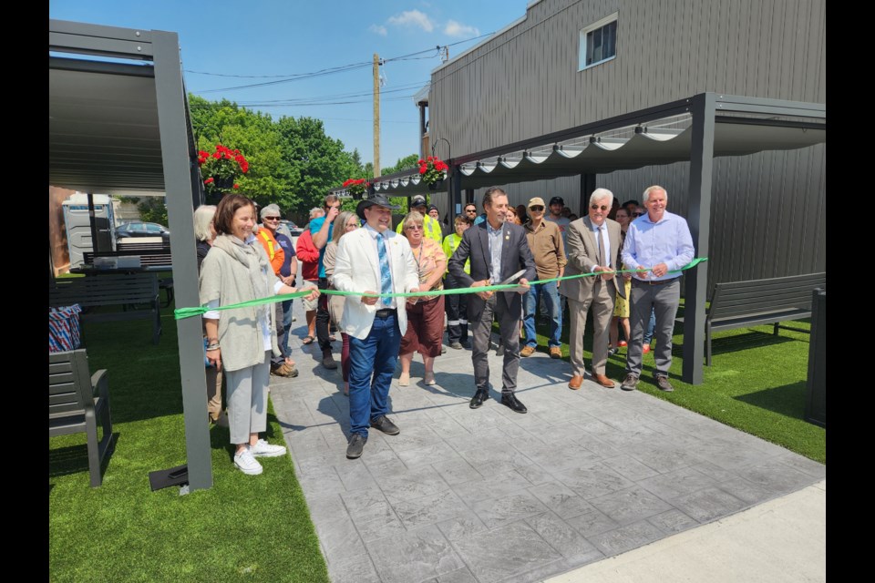 1: From left: Coun. Nadia Dubyk, Deputy Mayor Dane,Nielsen, Mayor Paul McQueen, Coun. Tom Allwood and  Coun. Paul Allen participated in the official ribbon cutting for the new Hillis Burnside Memorial Park.