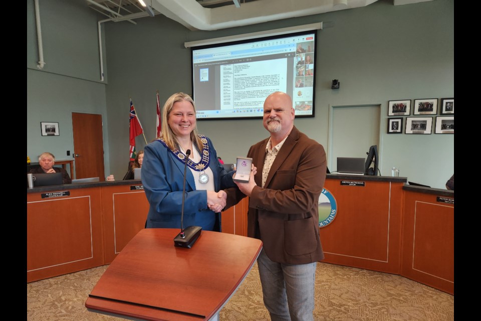 The Blue Mountains CAO Shawn Everitt received his 15 year pin from Mayor Andrea Matrosovs in 2024.