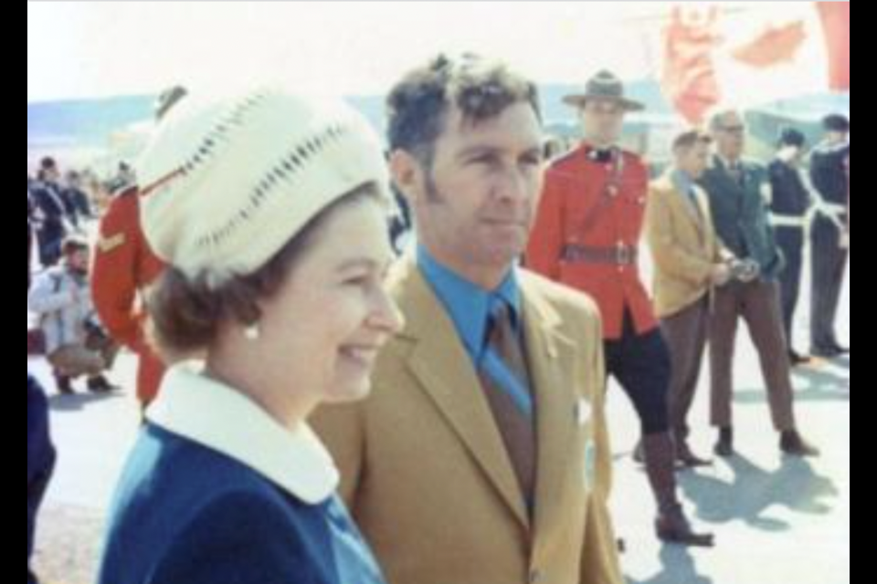 Queen Elizabeth II with then Dawson Creek Mayor Robert Trail.