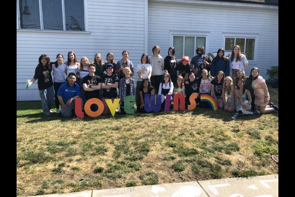 Students from Delta Secondary helped spread messages of love, support and pride on Thursday afternoon at Ladner United Church. Following the vandalism to the church and Pride flags on Wednesday, the students drew chalk art on the sidewalks and steps around the church to show their support.