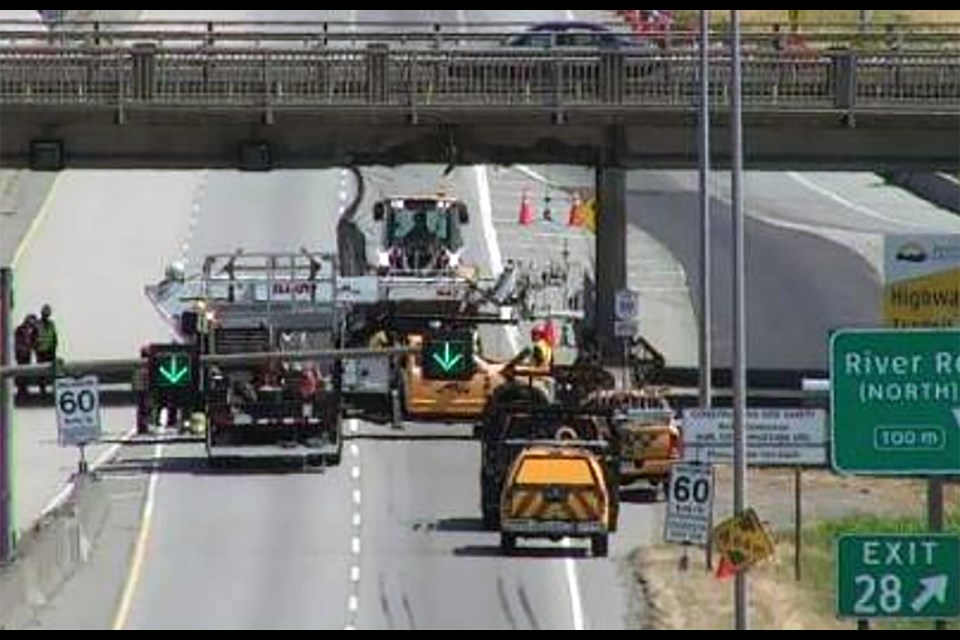 Crews continue to work on the Highway 17A overpass at this hour with southbound 99 traffic being re-routed to Highway 17A. Drive BC Photo