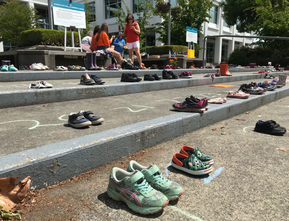 shoes at delta city hall remembering 215 first nations children buired at kamloops residential school