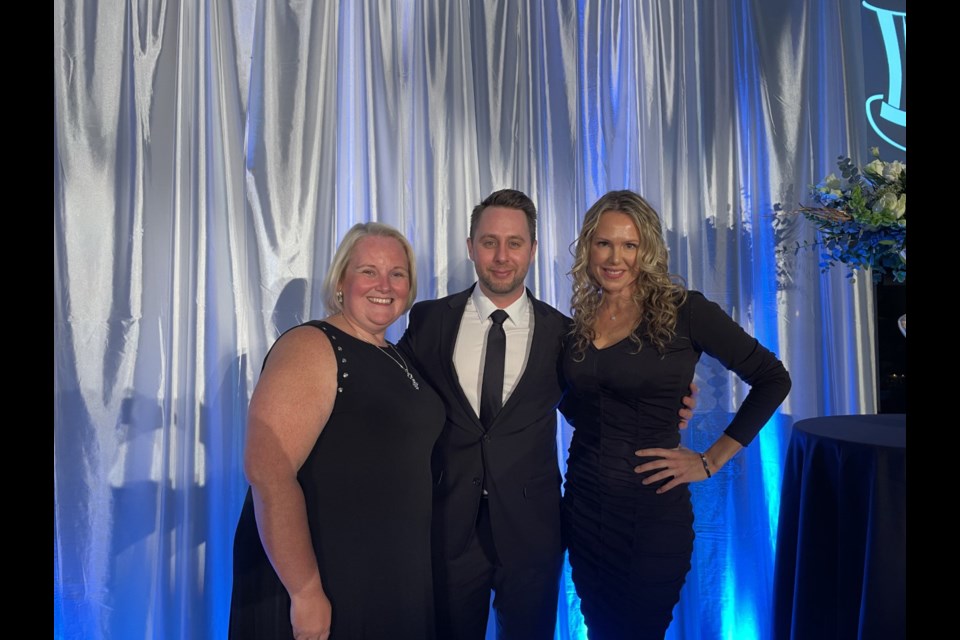 Delta Chamber of Commerce executive director Jill McKnight, MC Brad Becir and Chamber board chair Rosanne Horner.