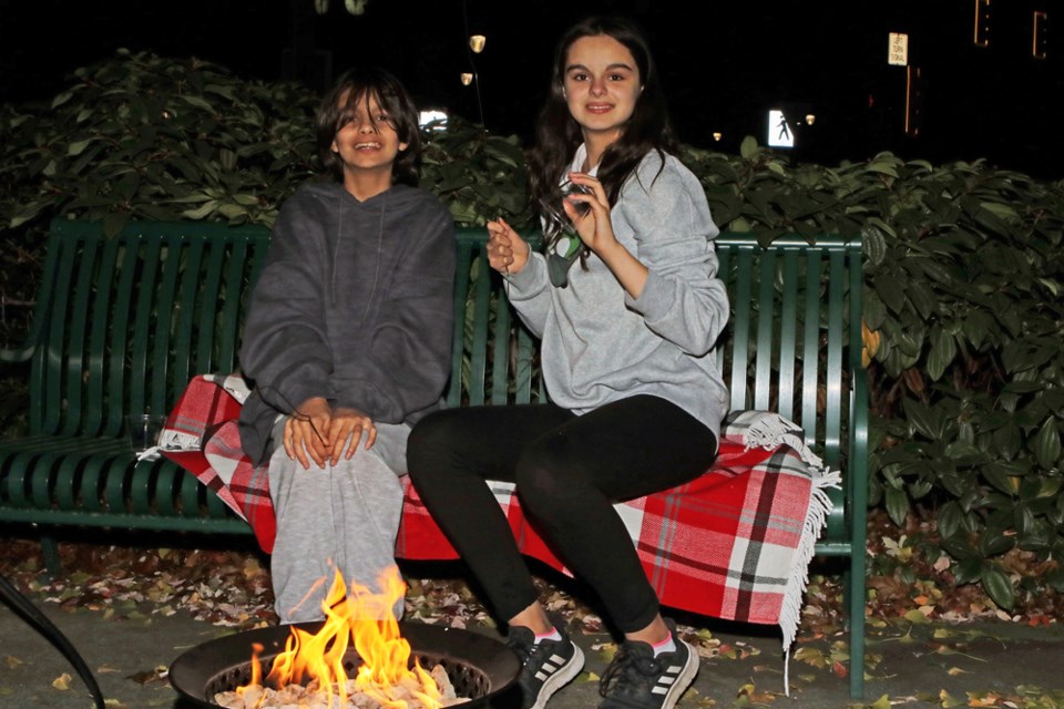 Evee and Smirah Singh cooking smores on an open fire was part of the fun activities for last Thursday's Ladner Village Christmas Open House that saw many merchants extend their hours for the special night. This Thursday (Nov. 24) is another big holiday event in the village with the Ladner Business Association's tree lighting celebration. 