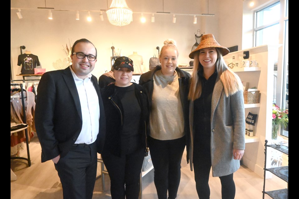Delta Coun. Dylan Kruger and Tsawwassen First Nation's Victoria Williams (far right) with X-Treme Clothing Boutique owner Lisa Fleischer and her daughter Madison during Wednesday's grand opening celebration at the new Tsawwassen Town Centre Mall location. 