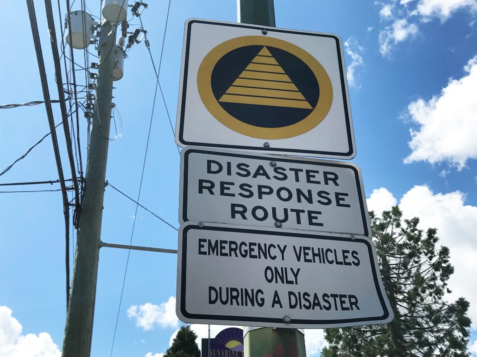 delta-disaster-emergency-sign-delta-optimist-pic