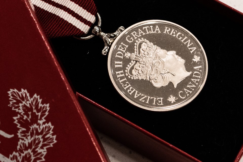 Queen's medal for min minute column
