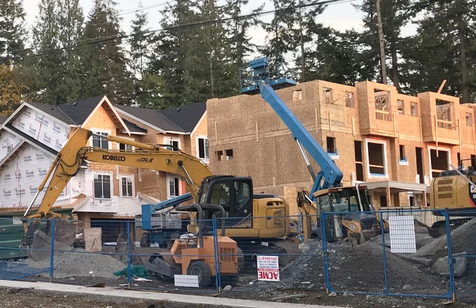 delta-bc-townhouse-construction-delta-optimist-photo