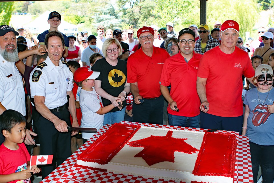 It was a beautiful day on Friday as the community came out to celebrate Canada Day at Diefenbaker Park. Pictured left to right cutting the large Canada Day cakes are: Delta Deputy Fire Chief Tim Ipsen, Delta Police Chief Neil Dubord, Delta MP Carla Qualtrough, Delta South MLA Ian Paton, Delta Coun. Dylan Kruger and Delta Mayor George Harvie.