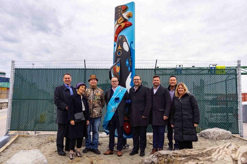 Staff from both GCT and TFN gathered at the unveiling of the house post outside GCT Deltaport's administrative building on Nov. 10.