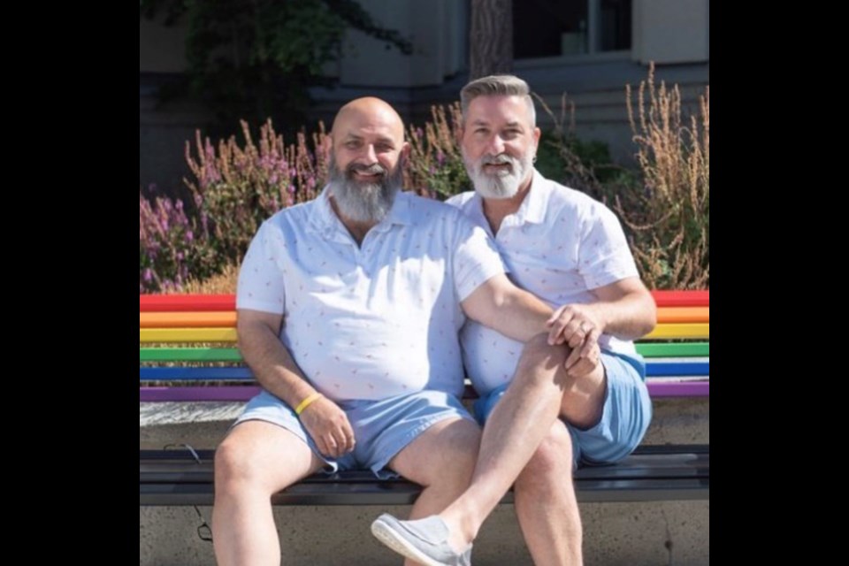 Delta Pride Society President John Darras (he/him) left, with husband Sandy Drover