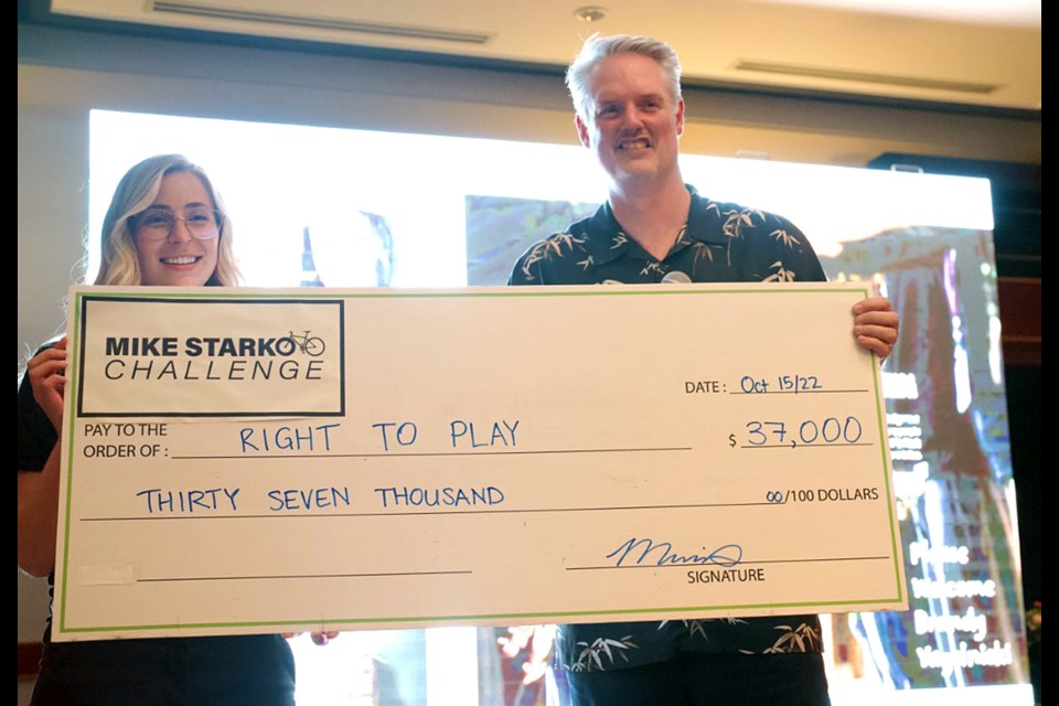 Mike Starko Challenge committee member and event founder Warren Purchase presented Right to Play delegate Brandy with a cheque for $37,000 at last Saturday's wrap-up gala at a sold out Beach Grove Golf Club. 
 