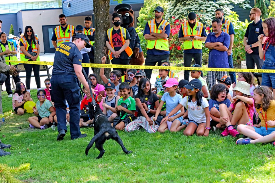 Const. Jen West, PPSD Rudy with a demonstration at Police Day hosted by Delta Police at Sungod Recreation Centre in North Delta.