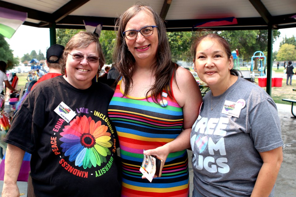 L-R Gillian McLeod, Morgane Oger and Christa Horita Kadach welcomed everyone to the Delta Pride Society Picnic on Sunday, Aug. 20 at Memorial Park in Ladner.