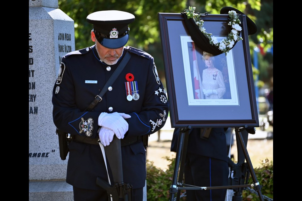 Delta Police St. Ken Usipiuk was among the vigil sentries during a memorial service for Queen Elizabeth II on Monday, Sept. 19 at Memorial Park in Ladner.  