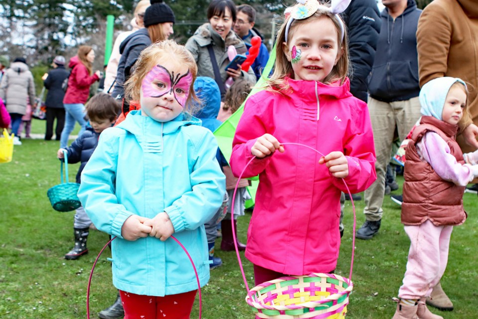 The Tsawwassen Rotary Club hosted a pancake breakfast and Easter egg hunt at Diefenbaker Park on Saturday, April 8, while the Ladner Business Association hosted its Easter Parade and egg hunt at Memorial Park on Sunday. Familes from throughout Delta braved the wet, rainy weather to celebrate Easter.
Sidney and Harper Chies at Diefenbaker Park.