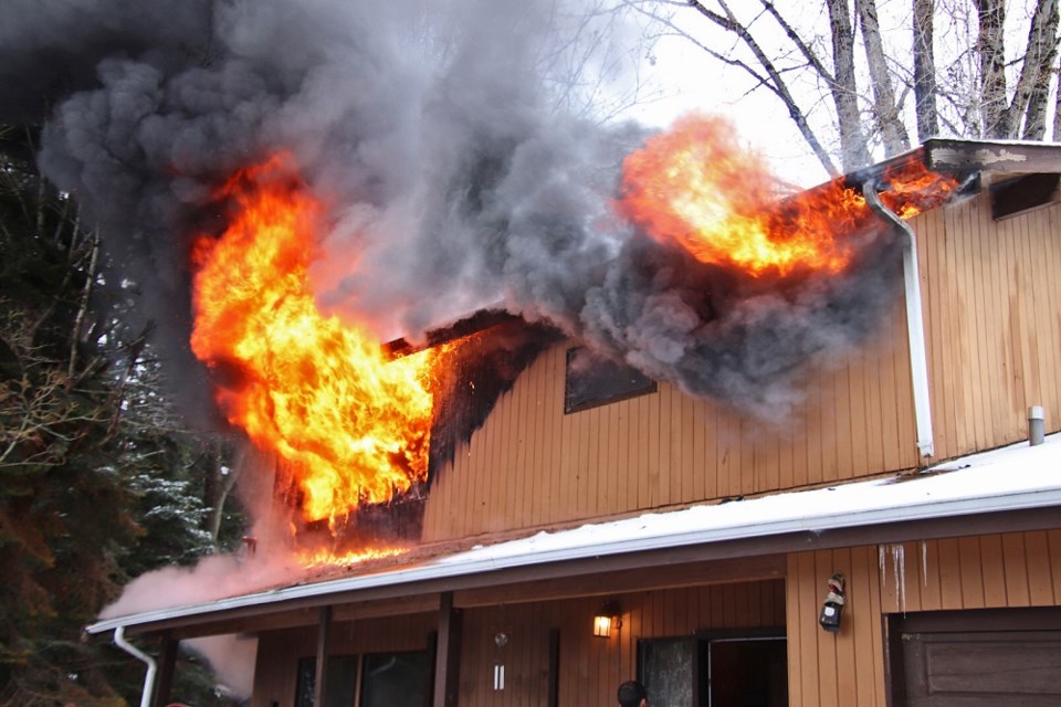 Five people narrowly escaped serious injury from a home that was destroyed by a raging fire Monday morning in North Delta.