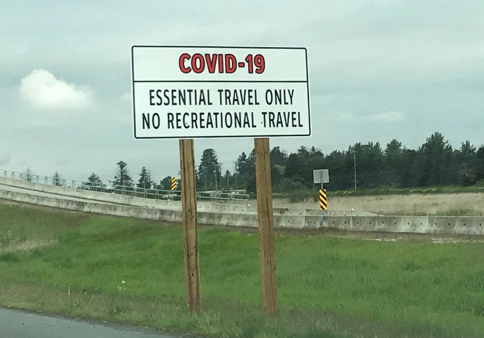 delta bc highway covid travel  sign