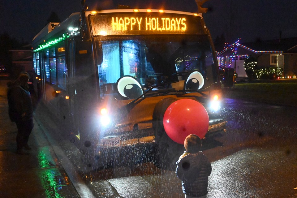 One of Tranlink's nine Reindeer buses made a special visit to Ladner's Candy Cane Lane (55A Avenue) Tuesday as part of its Lower Mainland Christmas Bureau toy donation campaign. 