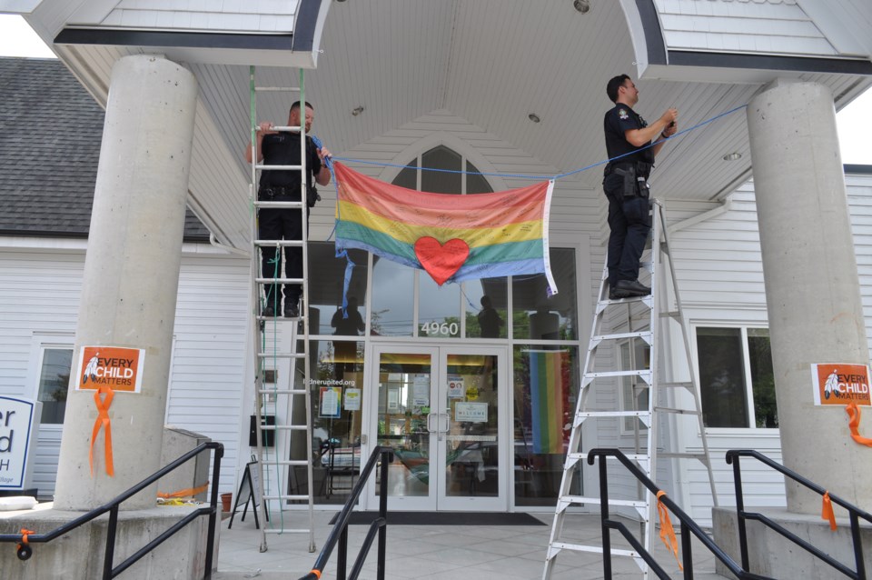 DPD officers hang new pride flag