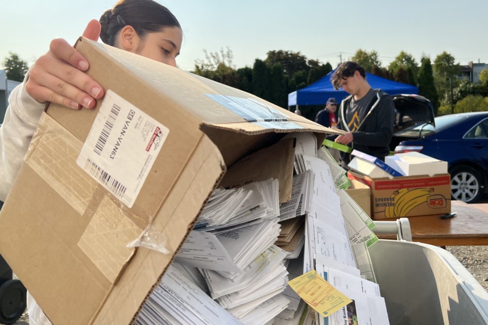 interactor-dumping-paper-in-bin-2