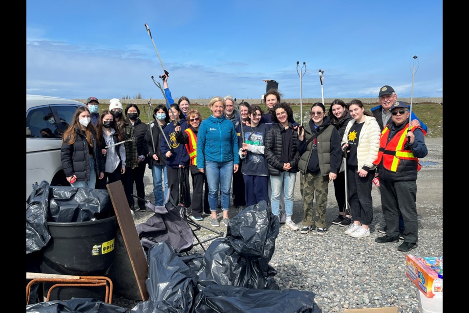 Members of the Rotary Club of Tsawwassen, friends of Rotary and students from the Interact Club of South Delta Secondary went to work Saturday helping to clean up a large beach area in Tsawwassen.