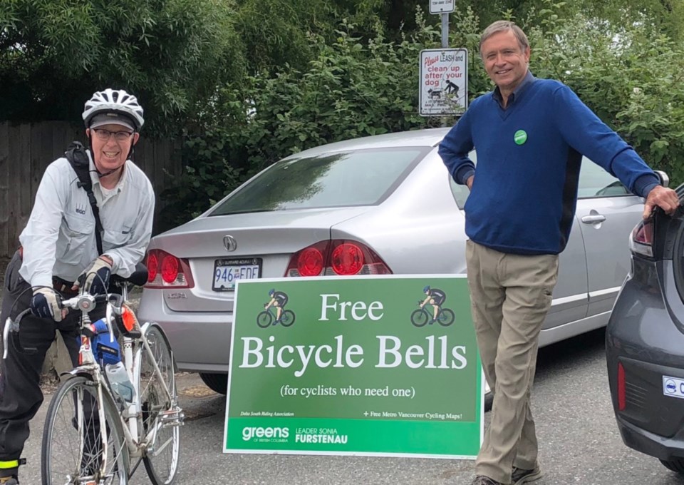 green party giving out free bike bells