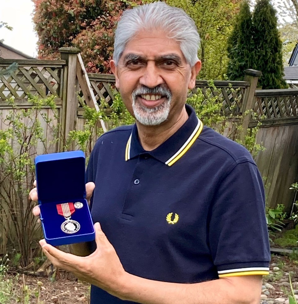Andy Basi medal for volunteers
