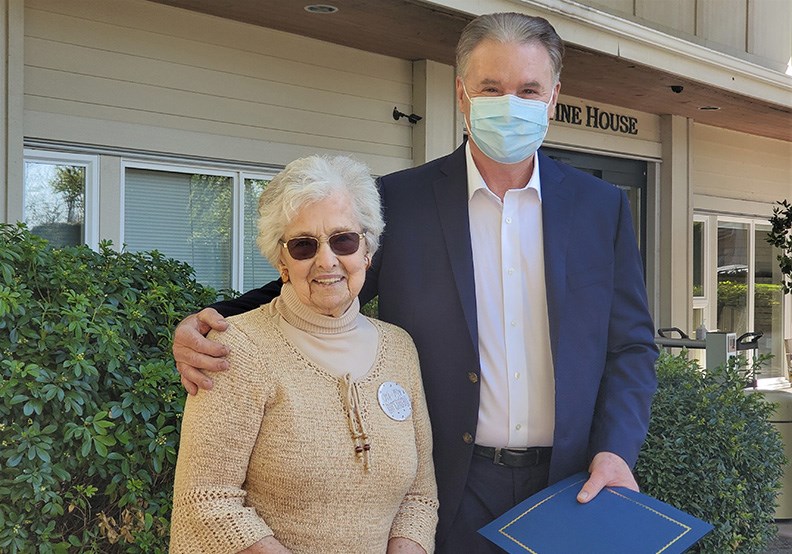 Delta Mayor George Harvie made a visit to the Augustine House last Friday to offer early birthday wishes to 100-year-old resident Charlotte England. 