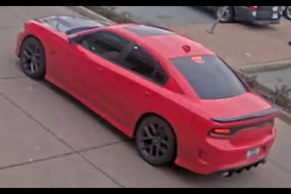 A red Dodge Charger was used by the suspects in the shooting and subsequently set on fire a short distance away in Delta. 