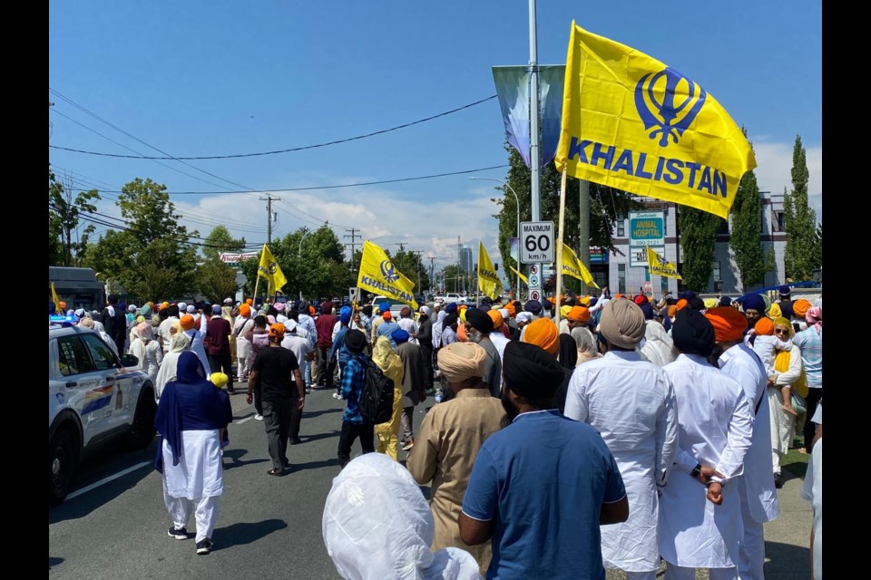Hundreds have gathered at the temple and then street fronting it for a demonstration Sunday afternoon.
