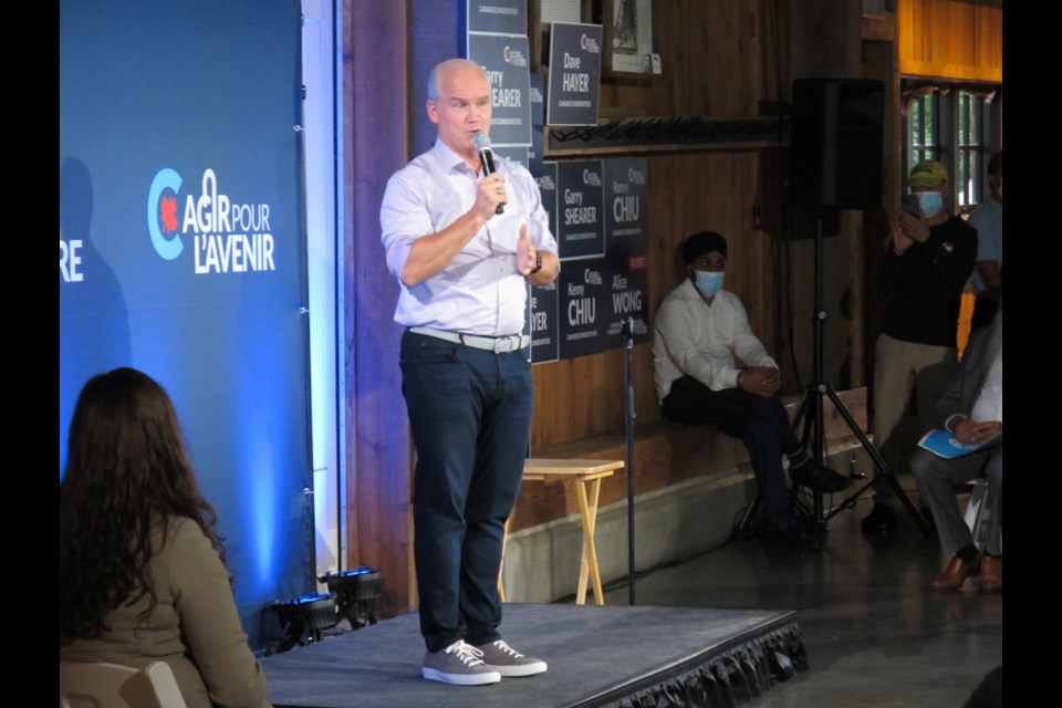 Conservative Party leader Erin O'Toole speaks to supporters during a campaign rally stop at Ladner's Harris Barn on Saturday night.                              