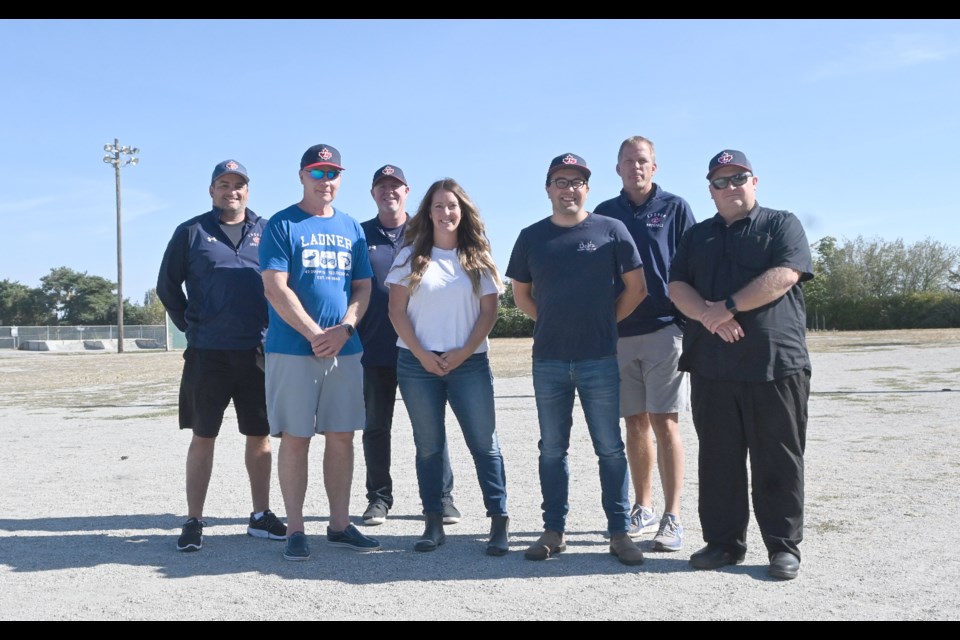 Delta Mayor George Harvie with councillors Alicia Guichon and Dylan Kruger, along with the Ladner Minor Baseball executive at Cromie Park in Ladner where a new master plan includes a $1.4 million indoor training baseball centre. 