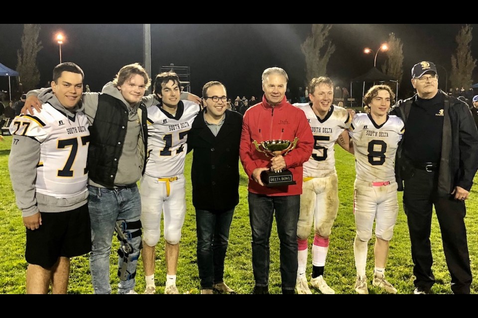 Delta Mayor George Harvie and councillor Dylan Kruger presented the inaugural Delta Bowl to South Delta captains and head coach Ray Moon after a 34-21 win over Seaquam on Friday night at John Oliver Park. 