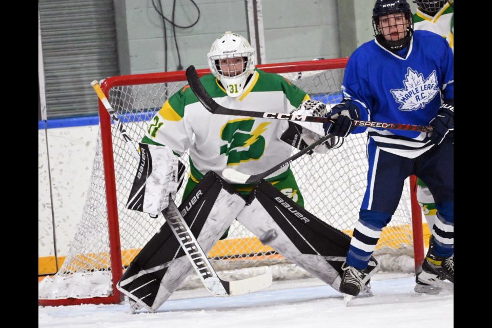 Edmonton gets some traffic in front of U18 South Delta Storm goalie Brady MacDonald during opening day play at the 28th annual Tim Jardine U15/U18 Showcase. The tournament continues through Sunday. 