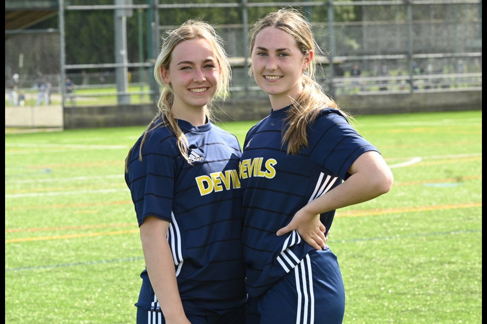 Grade 12 twins Kate (left) and Jane will end an outstanding nine-year run for the McDonald family on SDSS senior athletic teams at next week's B.C. AAA Girls Soccer Championships.
