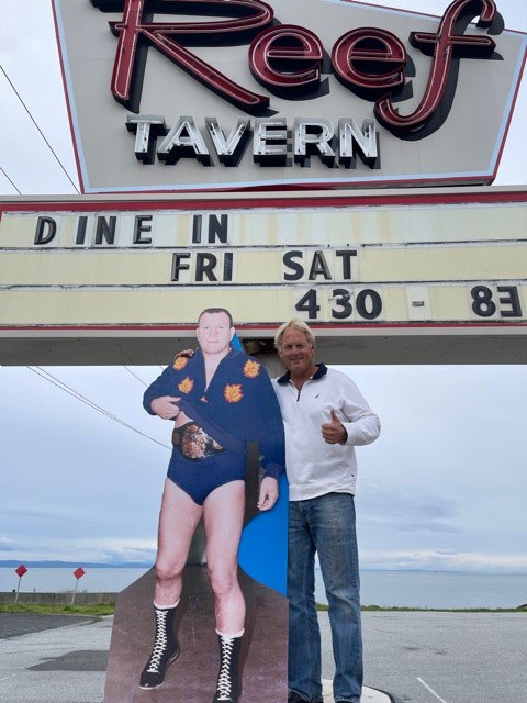 Kiniski's Tavern Reef owner Nick Kiniski with a cut out figure of his father Gene Kiniski who is part of the 2021 B.C. Sports Hall of Fame induction class. 