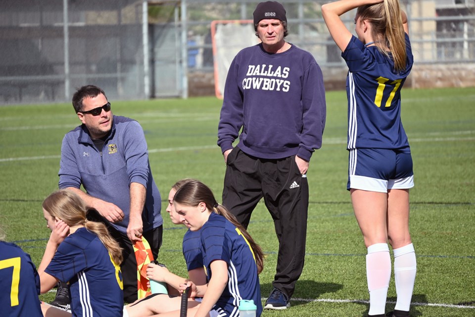 Longtime SDSS soccer coaches Brent Sweeney (left) and Stephen Burns are looking to take the senior girls team back to the provincials for the 19-consecutive season. 